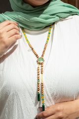 سبحة من خشب الورد الطبيعي وحجر الروز كوارتز