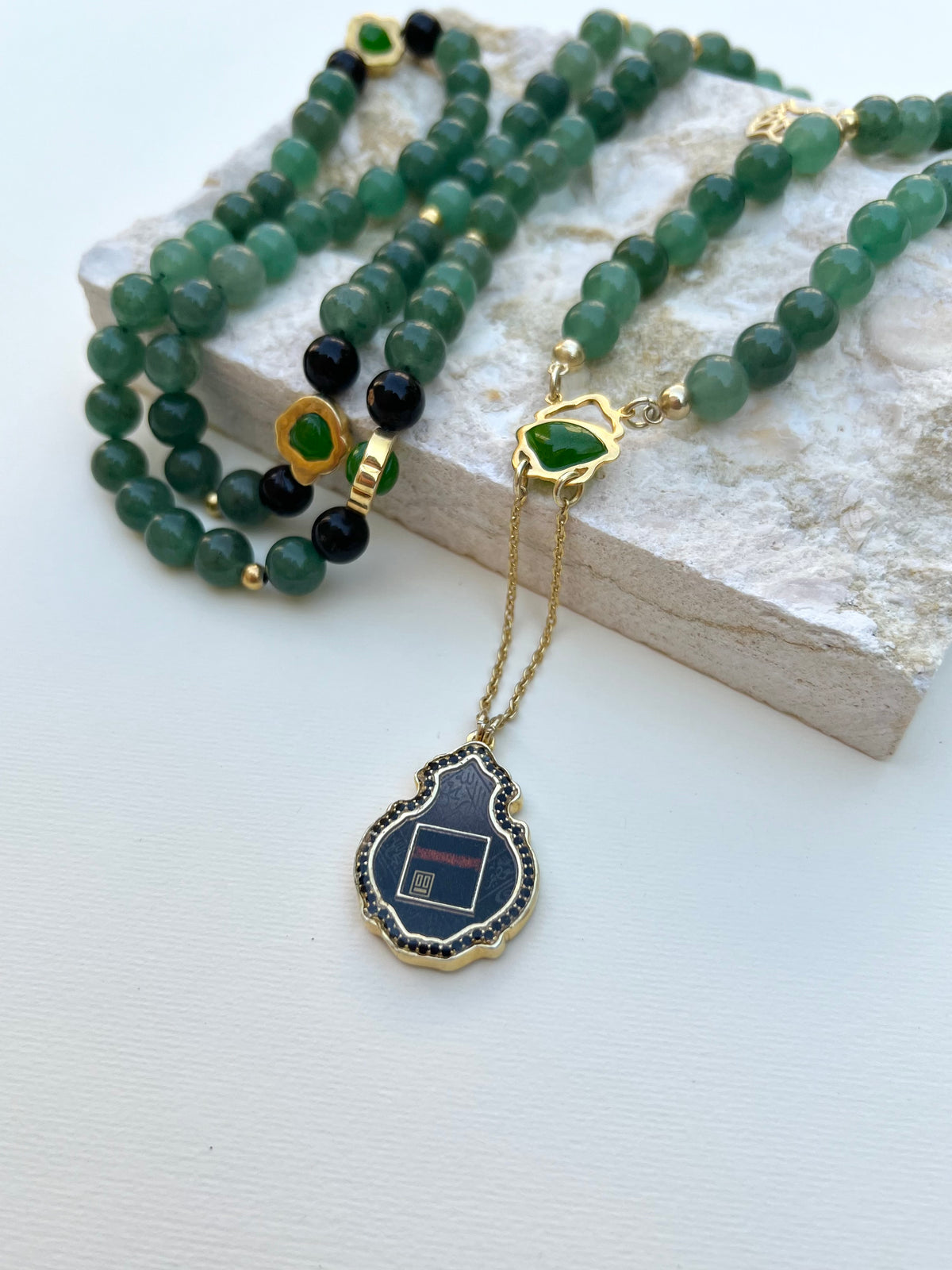 سبحة الجاد الطبيعي ودلاية وجه المسجد النبوي والكعبة الشريفة